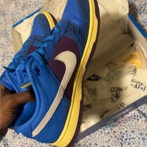 Blue and Purple Sneakers with Yellow Accents